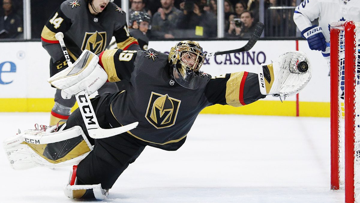 Vegas Golden Knights goaltender Marc-Andre Fleury (29) dives to make a glove save against the Toronto Maple Leafs during the third period of an NHL hockey game Tuesday, Nov. 19, 2019, in Las Vegas. (AP Photo/John Locher)